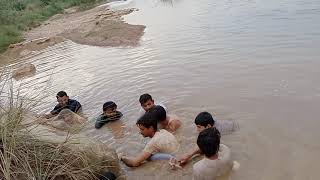 Village boys fishing in River by net, catching rao fish, incredible fishing