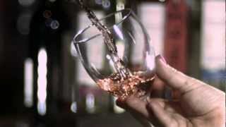 Slow motion of drinks being poured and a beer barrel being tapped.avi