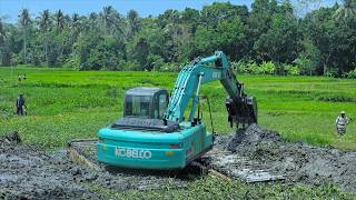 Excavator Working Digging Deep Mud To Make The River Flowing Again