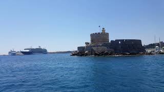 Ride with the red submarine Rhodes , Mandraki Port view