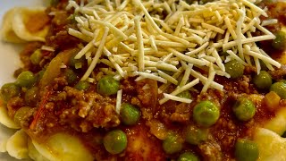 Orechetti Pasta with Sugo and green peas