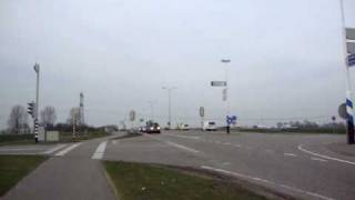 A1 Ambulance 07-110 met Spoed onderweg naar het Dorpsplein Herveld.