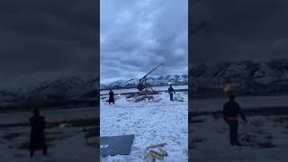 Man builds a trebuchet