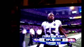 Baltimore Ravens Terrell Suggs punches camera at Super Bowl