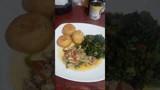 steam Callaloo with cook up salt fish and fry dumpling