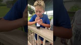 Kid drinks Dr. Pepper with Mentos