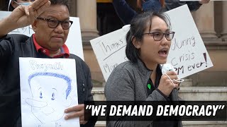 Attending an anti-Thai government protest in Sydney