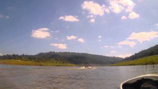 girls tubing behind boat