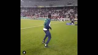 South African boy dancing in football stadium