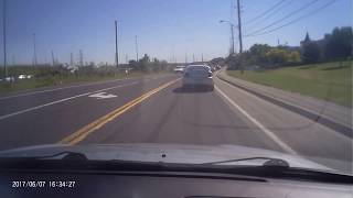 Recless Driver test driving JAG SUV in Bike Lane