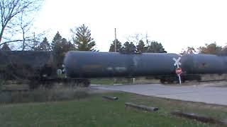 CN 3083 leads an ethanol train through Mills Tower