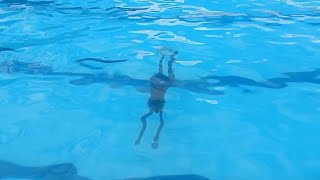 How Underwater breaststroke kicks move you faster underwater in a 25 meter pool