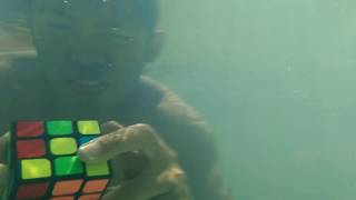 SOLVING RUBIK'S CUBE UNDERWATER