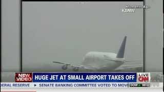 Huge jet at small airport takes off