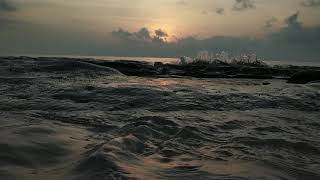 Sunrise and the sound of the beach waves at Havelock, Andamans.