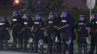 Protesters remain on Charlotte streets, defying midnight curfew