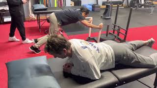 Prone press up leg rotated