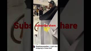 Boxer Floyd mayweather shows off the light shopping in Dubai