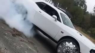 Big 392 challenger doing donuts on 32s floaters