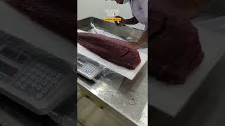 cutting giant tuna from aceh