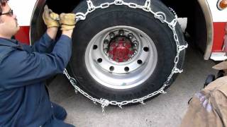 TireChain.com---Truck With Cam Tire Chains Installation