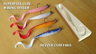 Lure making moulds tank testing the Buzzer Curltails Cod, Pollock and Bass lure.