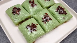 Sticky rice cake with sweetened coconut filling