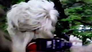 Dolly Parton with Chubby Checker at Dollywood in 1995, dedicating a Dolly Rose to Tony Chase