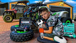 Den helps Mom fix the ATV