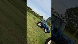 Ford 8210 and 7810 drawing bales