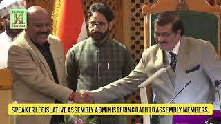 Speaker Legislative Assembly administering Oath to Assembly Members.