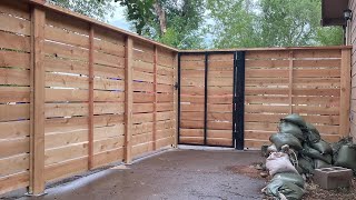 Cedar fencing on concrete with Postmaster posts