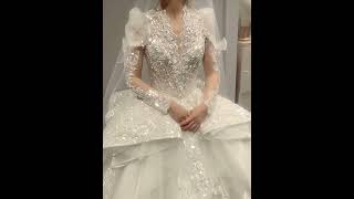 Women Apparels | Voluminous Long Lace Sleeve Wedding Gown