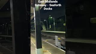 Class 66 Passes Through Rainhill Station