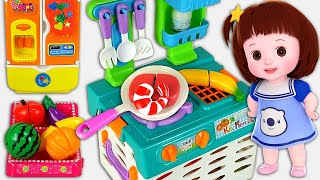 Baby Doli and mart register car and kitchen