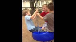 My boys on the tire swing at the #speakerjam