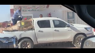 Checking our ration of food and fuel before leaving for Emjeyhidat from Bîr Mogreïn, Mauritania.