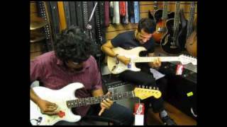 Ehsaan Noorani and Bruce Lee Mani (Thermal and a Quarter) jamming on Fender Strats.