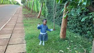 Anita Kabu entertaining her Daddy Simon Kabu