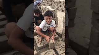 Children in Slavery Making Bricks