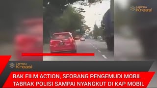 BAK FILM ACTION SEORANG PENGEMUDI MOBIL TABRAK POLISI HINGGA NYANGKUT DI KAP MOBIL