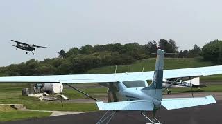 Vintage US Army Cessna O1 Bird Dog Plane in Action