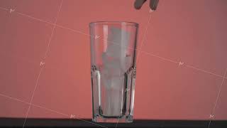 Close up hand putting ice cubes into a cocktail empty glass isolated on pink background. Action