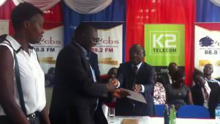 NUCAFE ED Joseph Nkandu receives the best Beverage Producer Award from the Katikiro