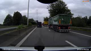 E313 richting Antwerpen .De brandende auto rijdt met hoge snelheid