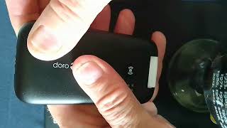 How to remove battery from a Doro feature phone