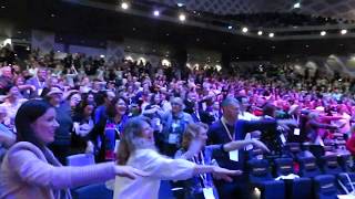 Father Rod Bower dancing with Lizzy at Happiness and It's Causes 2019