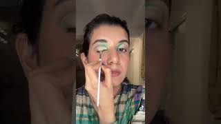 Creative makeup Day 3 💙🧡💚 #makeuptutorial #makeupartist #greeneyemakeuplook