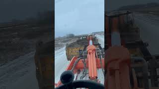 Pushing truck with loader