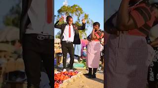 Moyadavid1 surprise a lady at the market (mama mboga)